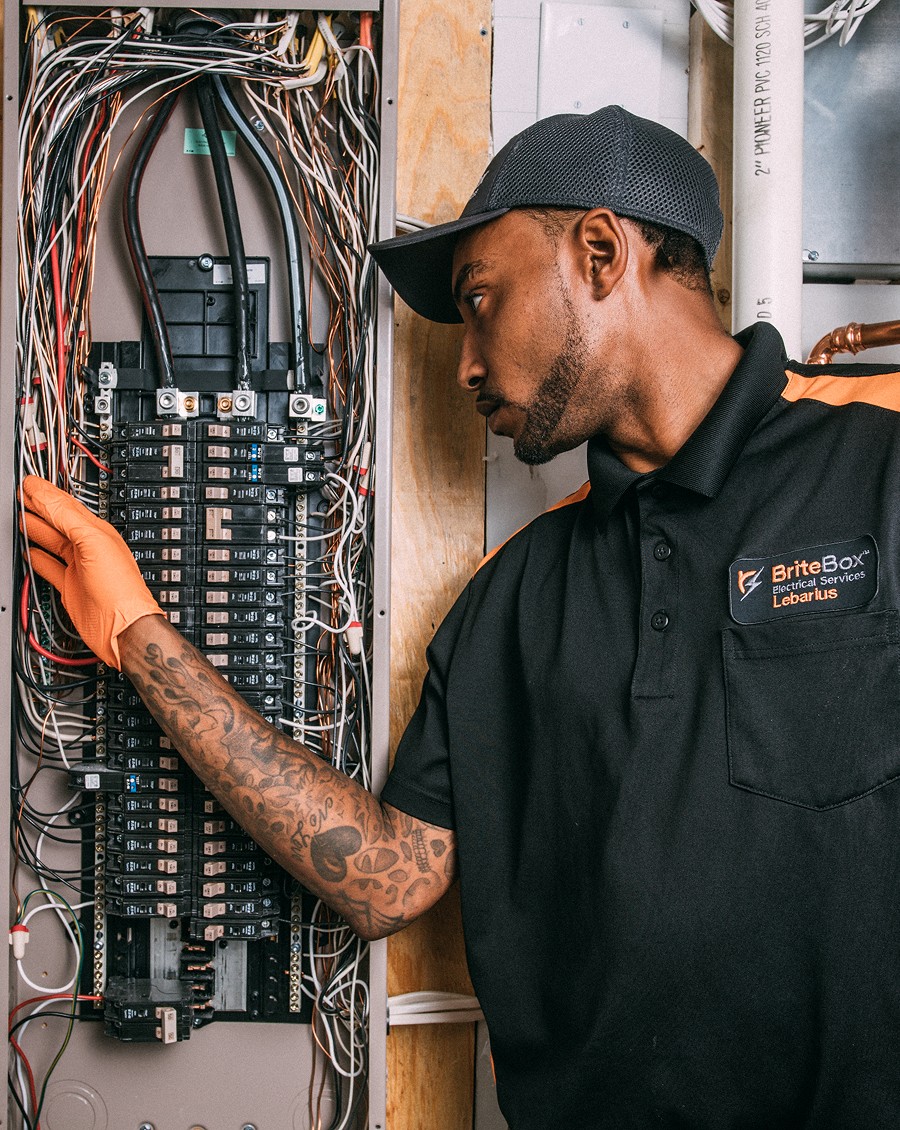 Electrician Inspecting Breaker Panel
