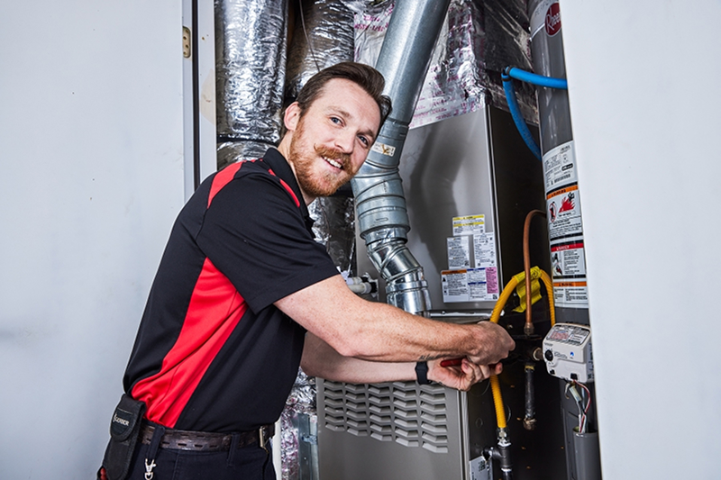 Ragsdale Technician with Water Heater